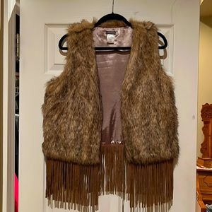 Faux fur vest with tassels, never been worn. Size XL